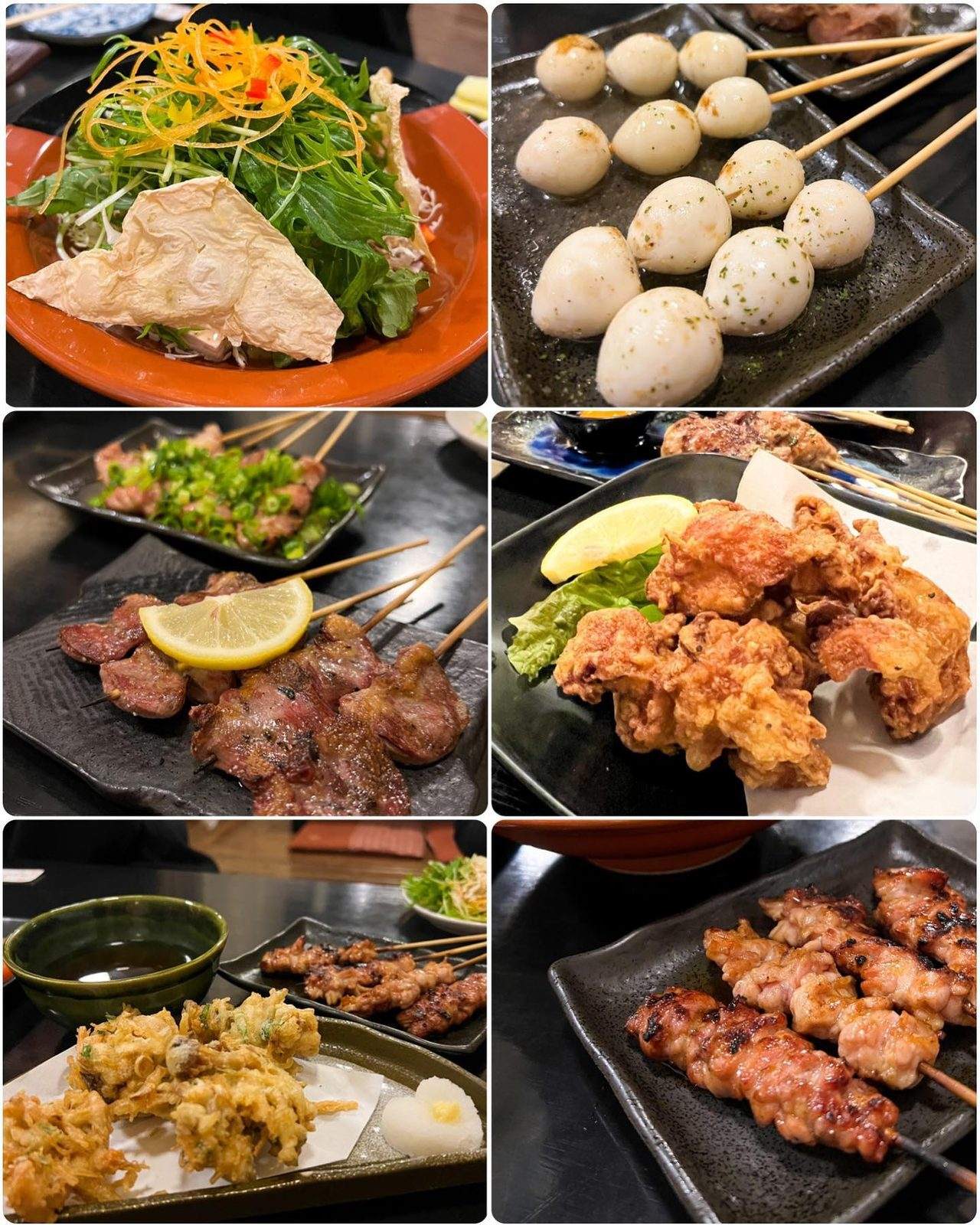 サラダやうずらの卵の串、唐揚げ、焼き鳥などがずらりと並んだテーブル